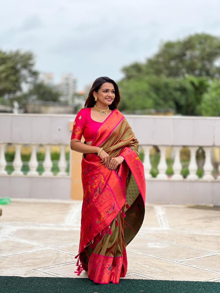 Soft Pethani silk saree with zari weaving design and Meenakari weaving Rich  pallu with Meenakari weaning turning peacock border & Tassels attached at Pallu end.