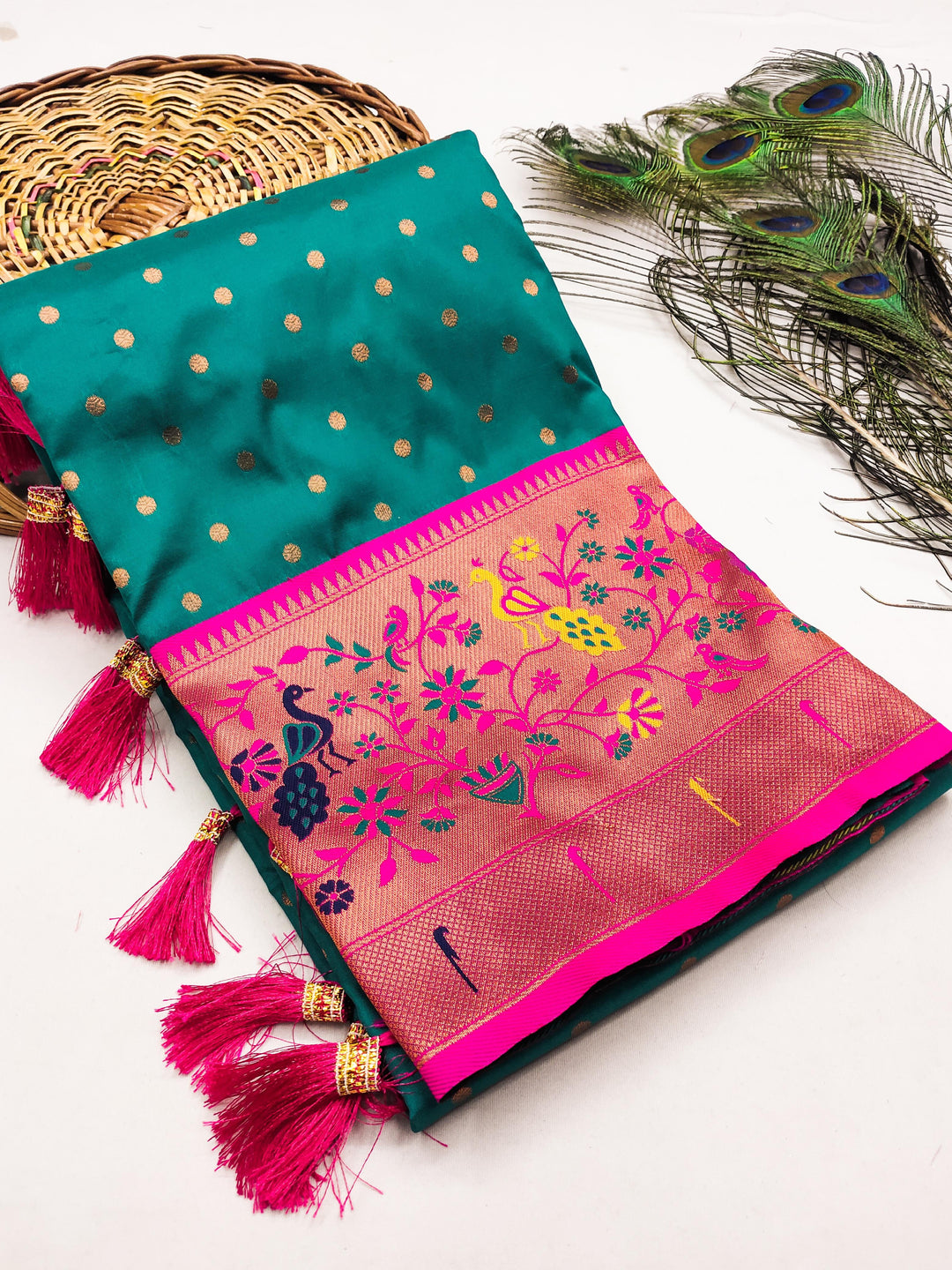 Soft Pethani silk saree with zari weaving design and Meenakari weaving Rich  pallu with Meenakari weaning turning peacock border & Tassels attached at Pallu end.