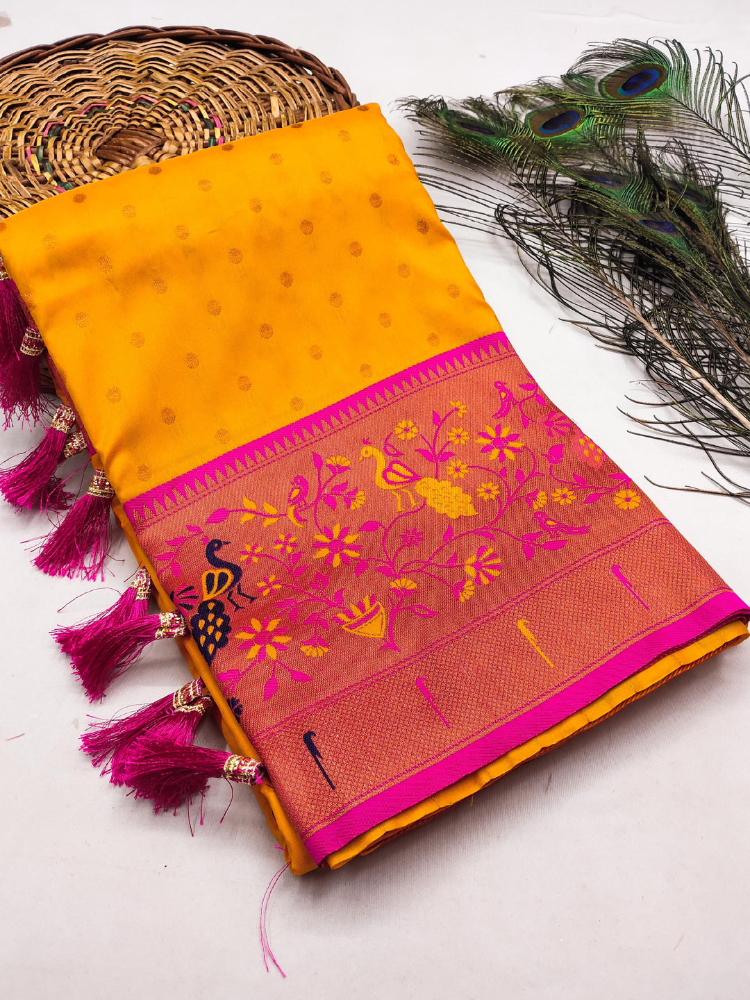 Soft Pethani silk saree with zari weaving design and Meenakari weaving Rich  pallu with Meenakari weaning turning peacock border & Tassels attached at Pallu end.