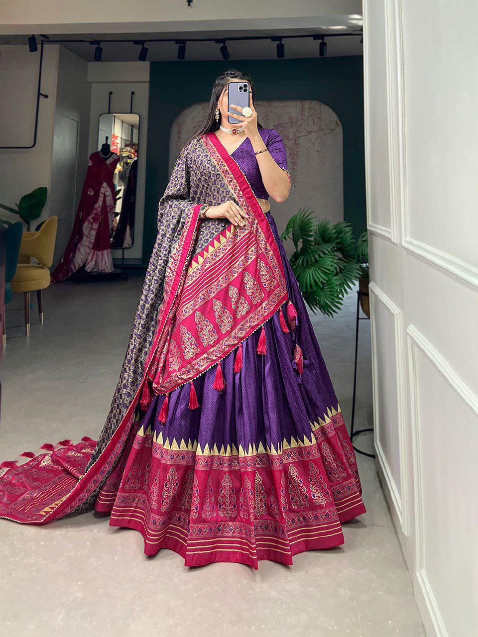 Artistry of Tussar silk and the mesmerizing allure of ikkat Patola prints with this exquisite lehenga cho ensemble.