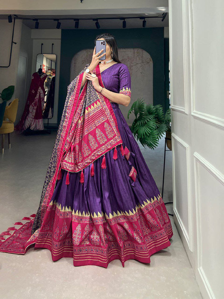 Artistry of Tussar silk and the mesmerizing allure of ikkat Patola prints with this exquisite lehenga cho ensemble.