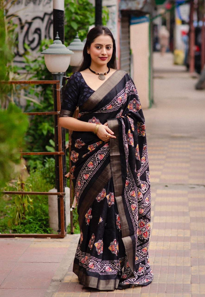 Soft Silk Slub Woven Saree With Batik Print Design.