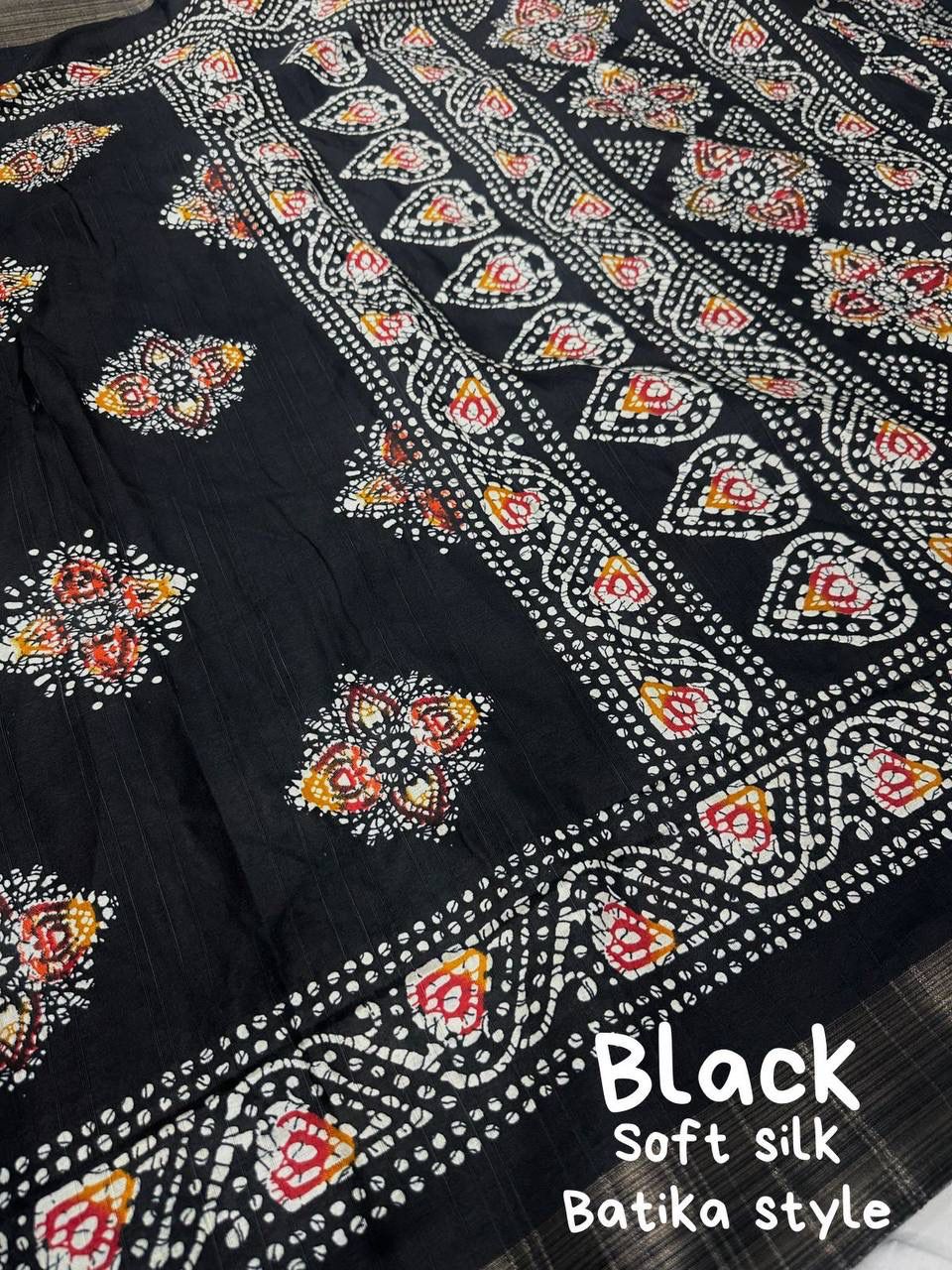 Soft Silk Slub Woven Saree With Batik Print Design.