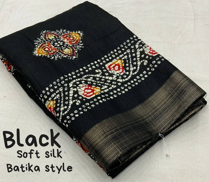 Soft Silk Slub Woven Saree With Batik Print Design.