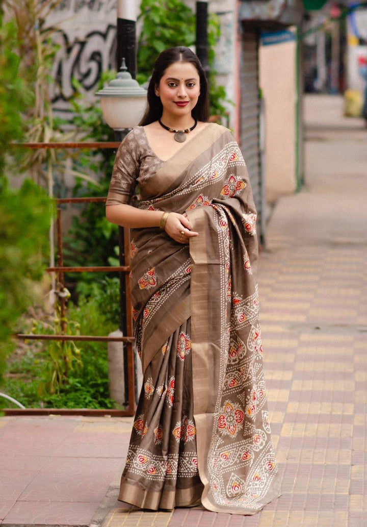 Soft Silk Slub Woven Saree With Batik Print Design.