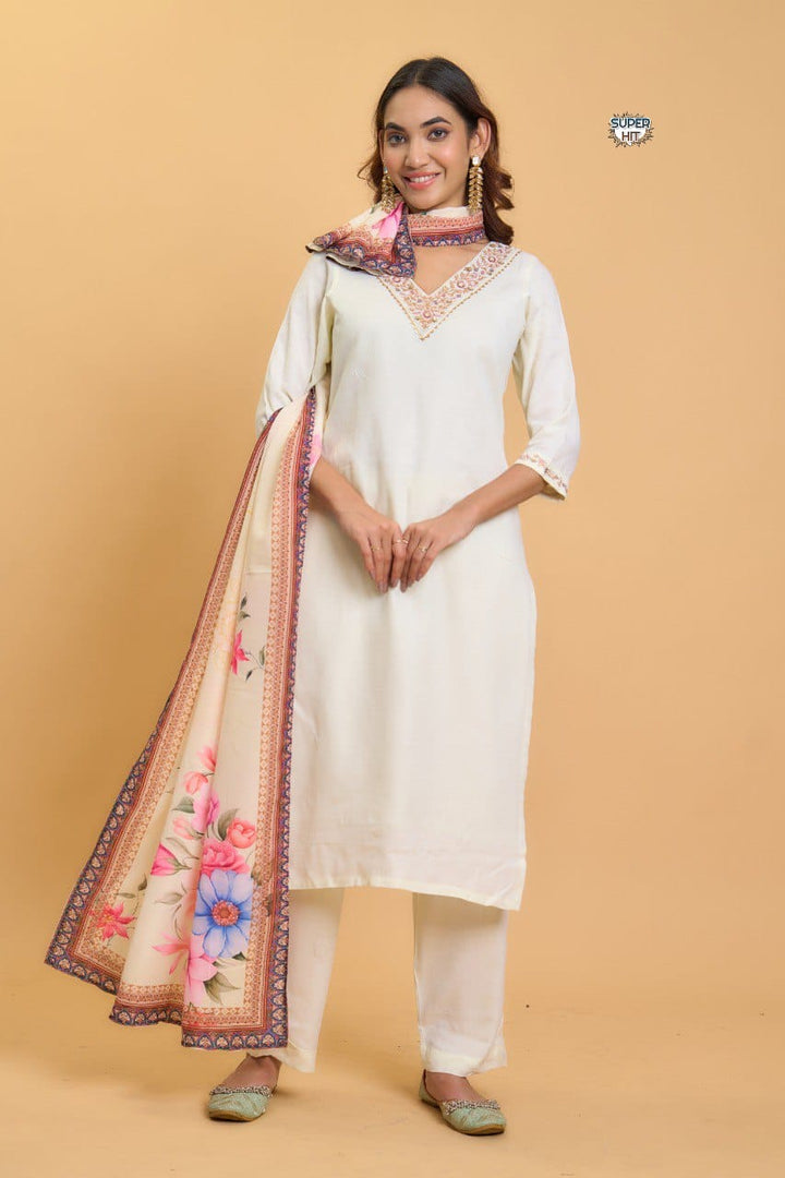 Pakistani Suit which is beautifully decorated with digital prints, sequin embroidery and lace