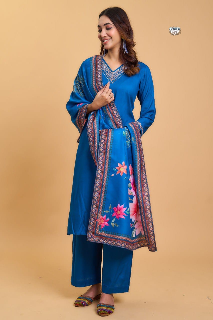 Pakistani Suit which is beautifully decorated with digital prints, sequin embroidery and lace