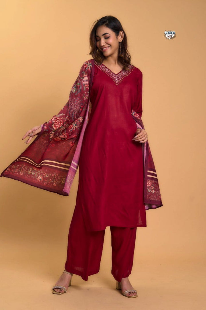 Pakistani Suit which is beautifully decorated with digital prints, sequin embroidery and lace