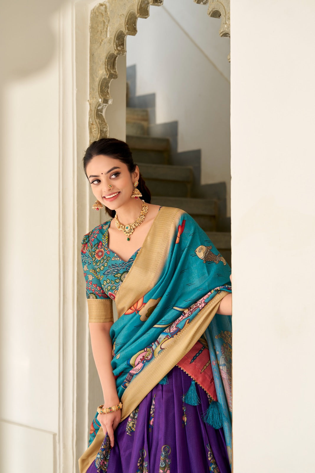 Dola Silk and the intricate charm of Kalamkari prints, the lehenga choli whispers tales of tradition and beauty