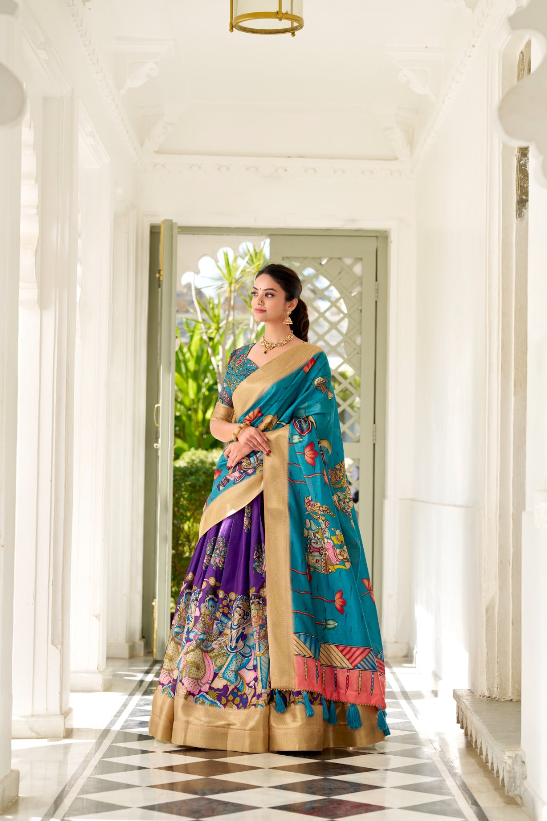 Dola Silk and the intricate charm of Kalamkari prints, the lehenga choli whispers tales of tradition and beauty