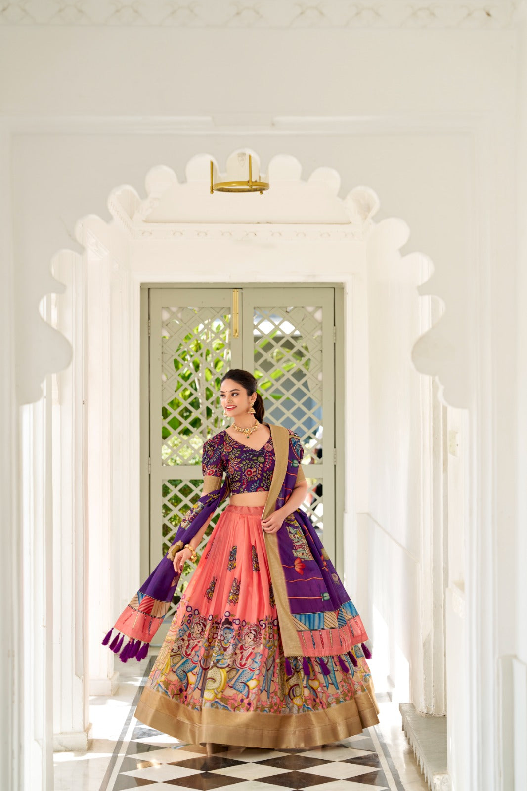 Dola Silk and the intricate charm of Kalamkari prints, the lehenga choli whispers tales of tradition and beauty