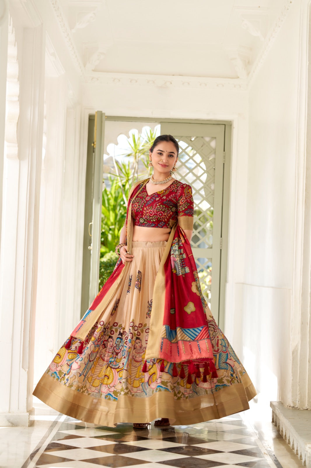 Dola Silk and the intricate charm of Kalamkari prints, the lehenga choli whispers tales of tradition and beauty