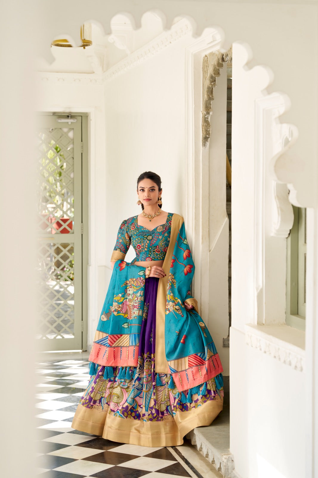 Dola Silk and the intricate charm of Kalamkari prints, the lehenga choli whispers tales of tradition and beauty