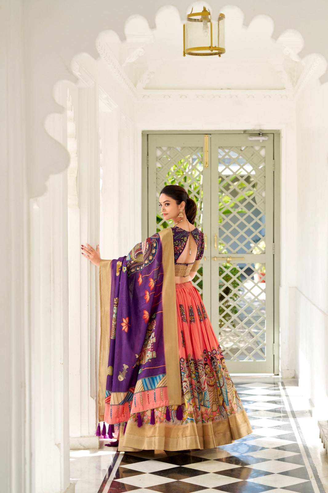 Dola Silk and the intricate charm of Kalamkari prints, the lehenga choli whispers tales of tradition and beauty